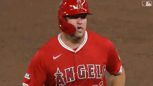 Baseball Player in Helmet Making Peace Sign