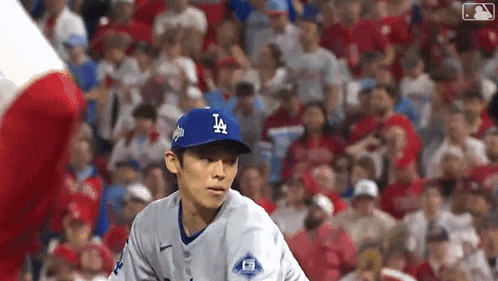 Baseball Player in LA Hat Facing Crowd