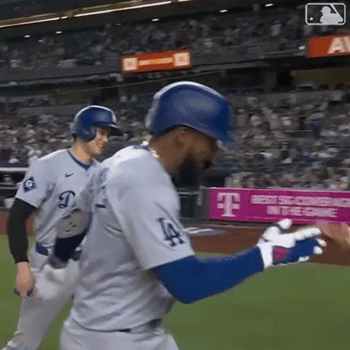 Baseball Player in LA Jersey Throwing Ball