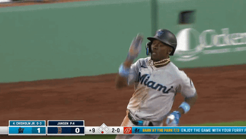 Baseball Player In Miami Jersey Runs To Base GIF