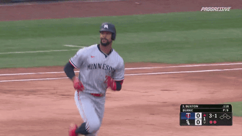 Baseball Player in Minnesota Jersey Running