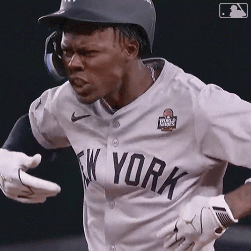 Baseball Player in New York Jersey and Gloves