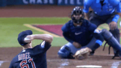 Baseball Player In Number 61 Jersey Ready To Throw Ball GIF
