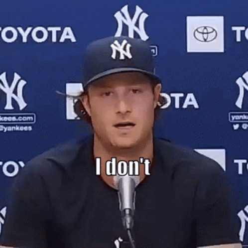 Baseball Player in NY Hat and Striped Shirt