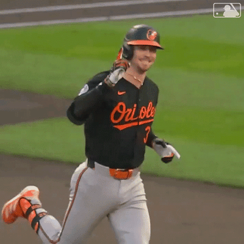 Baseball Player in Orioles Uniform Running