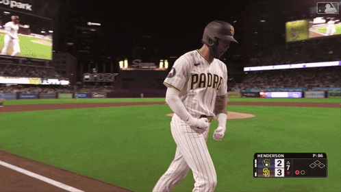 Baseball Player in Padres Uniform Walking on Field