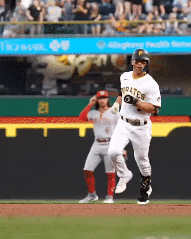 Baseball Player in Pirates Uniform Running
