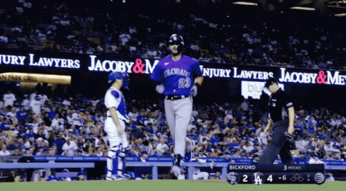 Baseball Player in Purple Uniform Number 23