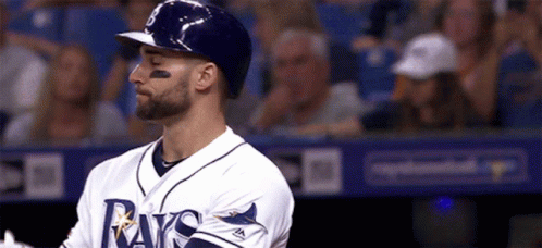 Baseball Player in Rays Jersey in Dugout