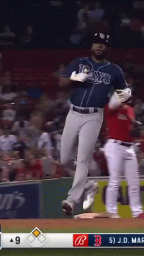 Baseball Player in Rays Jersey Running
