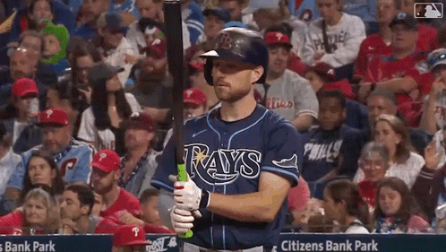 Baseball Player in Rays Uniform Holding Bat