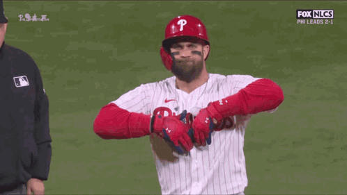 Baseball Player in Red Helmet With P