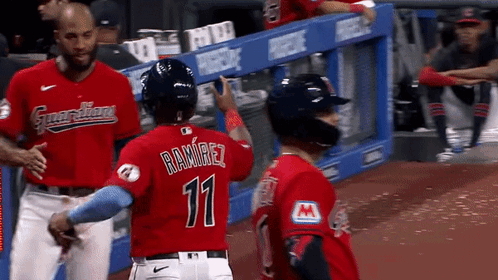 Baseball Player in Red Jersey Number 11