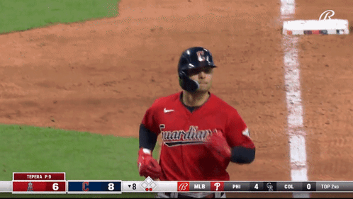 Baseball Player in Red Marlins Jersey
