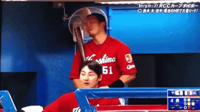 Baseball Player in Red Shirt Number 51