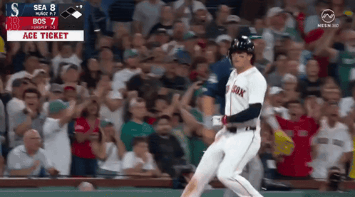 Baseball Player in Red Sox Jersey Walking Toward Crowd