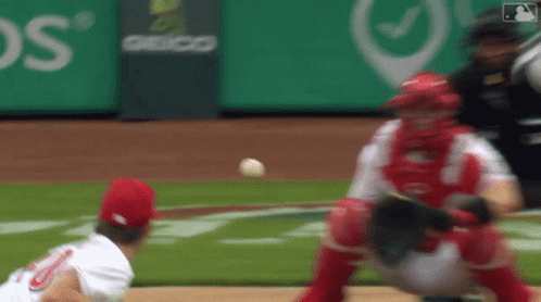 Baseball Player in Red Uniform Number 8