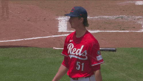 Baseball Player in Reds Jersey Number 51