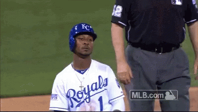 Baseball Player in Royals Jersey Kneeling