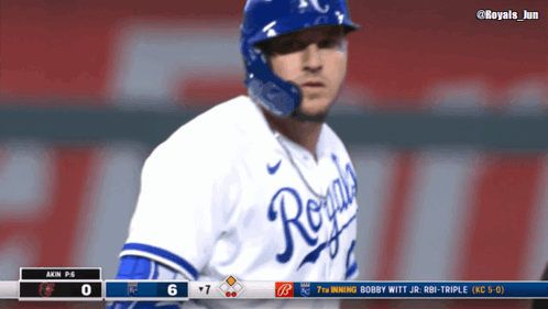 Baseball Player in Royals Uniform in Front of Scoreboard