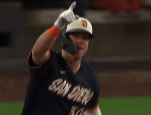 Baseball Player in San Diego Jersey Holding Bat