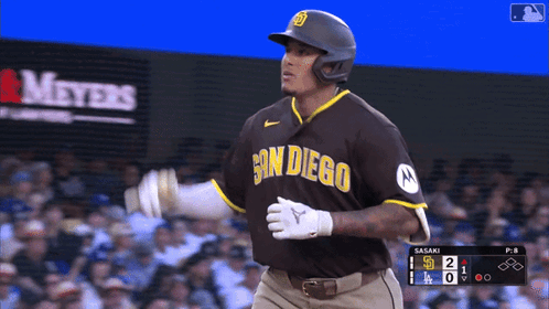 Baseball Player in San Diego Jersey Running Home