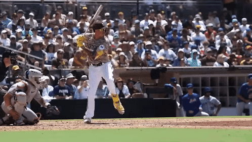 Baseball Player In San Diego Uniform Swings Bat GIF