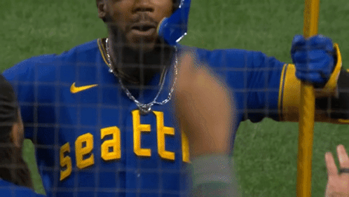 Baseball Player in Seattle Jersey