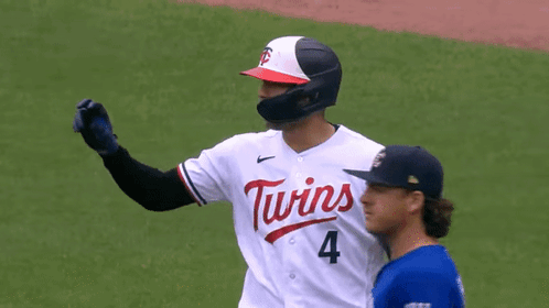 Baseball Player in Twins 4 Jersey