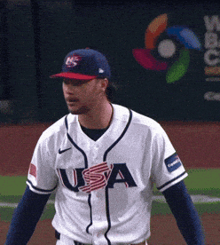 Baseball Player in USA Jersey and Blue Hat