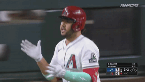 Baseball Player in White Jersey with Letter A