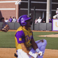 Baseball Player in Yellow and Purple Jersey Number 10