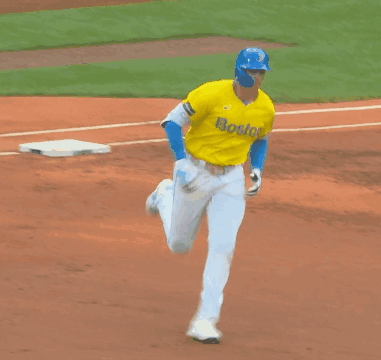 Baseball Player in Yellow Boston Jersey
