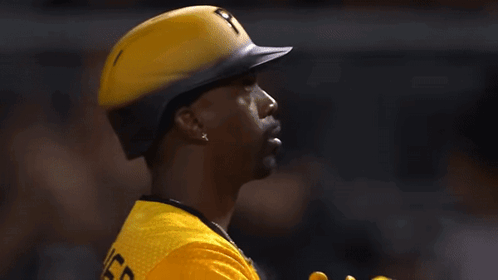 Baseball Player in Yellow Uniform With Letter P