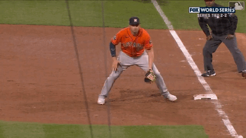 Baseball Player Kneeling on Field During Fox World Series