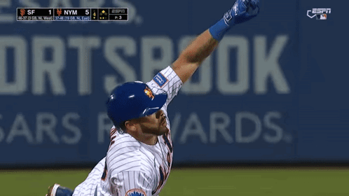 Baseball Player Laying in Front of ESPN Ad