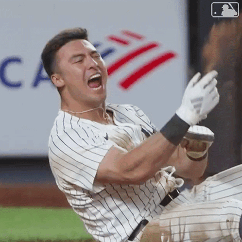 Baseball Player Lying on Ground