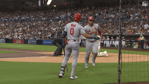 Baseball Player Number 0 Running To Another Player GIF