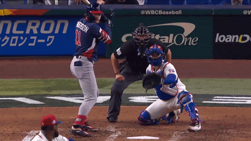 Baseball Player Number 11 Swinging Bat
