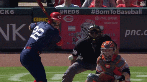Baseball Player Number 12 Swings At Pitch GIF