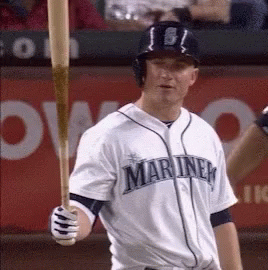 Baseball Player Number 15 Holding Bat