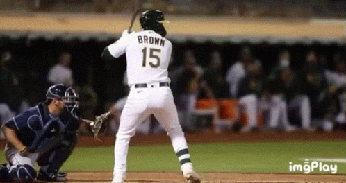 Baseball Player Number 15 Swinging Bat