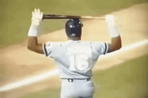 Baseball Player Number 16 Holding Bat Overhead
