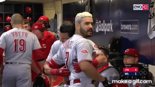 Baseball Player Number 19 Hugging Another Player