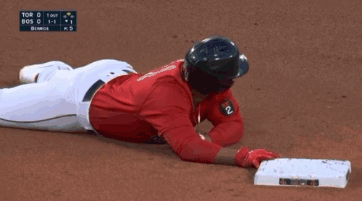 Baseball Player Number 2 Laying on Ground