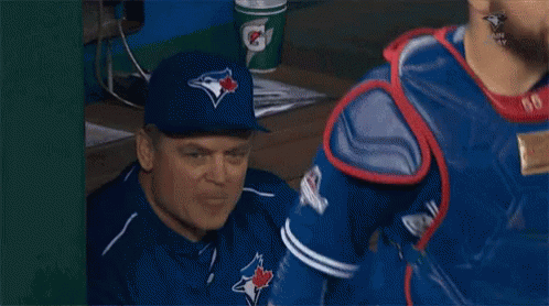Baseball Player Number 20 In Front Of Crowd GIF