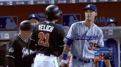Baseball Player Number 21 Talking to Another Player