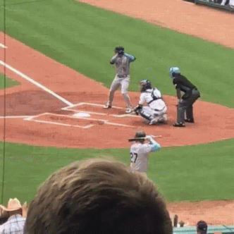 Baseball Player Number 27 at Bat