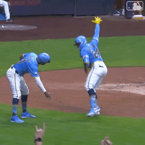 Baseball Player Number 28 Dancing on Field