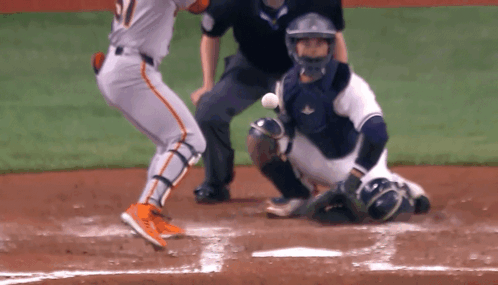 Baseball Player Number 29 About to Hit